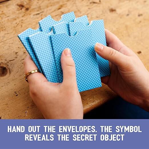 Hands holding fanned blue checkered envelopes with top notches over a wooden table and a purple instruction banner.