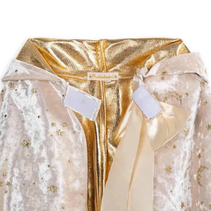 Cream crushed velvet cape with gold star embroidery, metallic gold lining, and a large satin bow fastener.