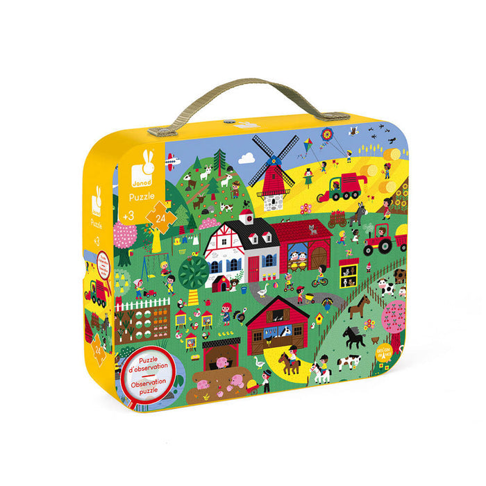 Yellow suitcase-style box with a handle featuring a vibrant farm illustration with a barn, windmill, and animals.