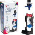 A blue bird toy with a top hat and red bow tie next to its box, featuring a glass body with blue liquid.