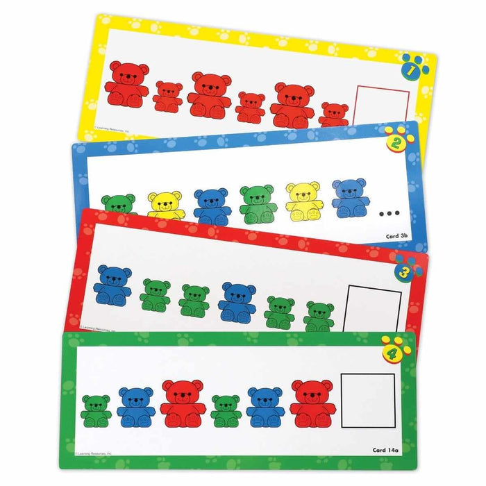Four colorful rectangular activity cards featuring patterns of red, blue, green, and yellow bears in various sizes.