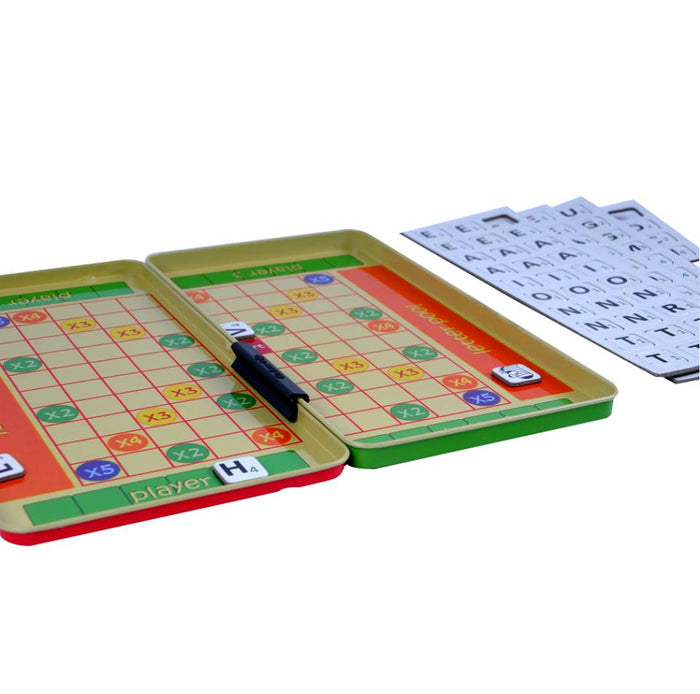 Open travel word game tin with colorful grid boards, magnetic letter tile sheets, and a black marker.
