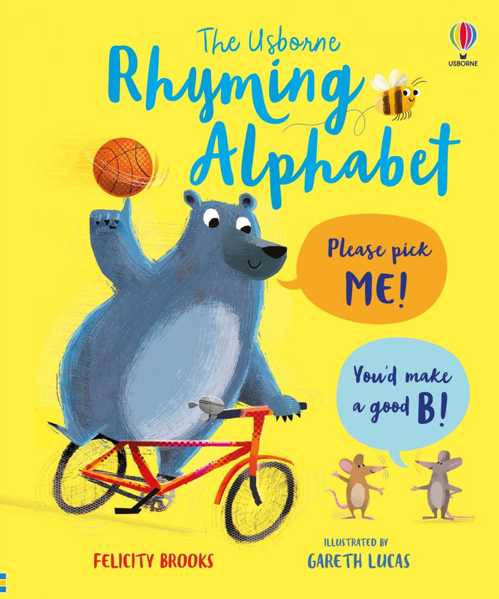 Blue bear on a red bicycle spinning a basketball on its finger against a bright yellow book cover.