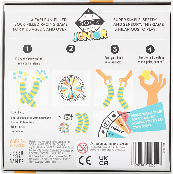 Back of white game box with instructions, yellow and blue striped socks, colorful game pieces, and a spinner board.