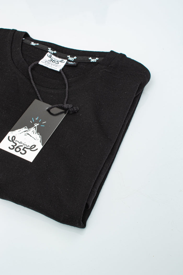 Black men's long sleeve shirt made of 100% Merino wool by Merino 365 NZ, featuring a classic fit and soft, breathable fabric.