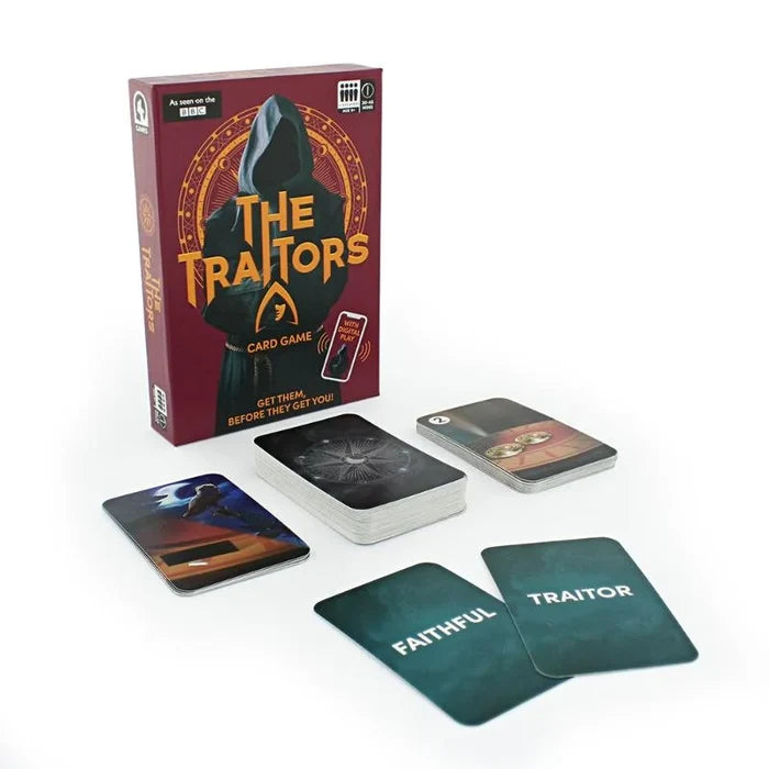 Dark red box with a hooded figure, stacks of cards, and teal cards labeled FAITHFUL and TRAITOR on a white surface.