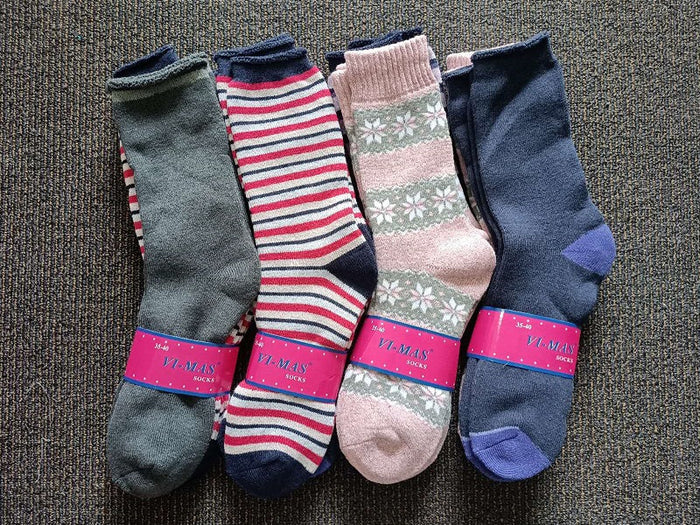 Pair of women's thick thermal crew socks in assorted colors, size 6-10, from dealonline.nz, perfect for cold weather.