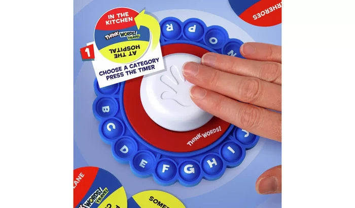 Hand pressing the central white button of a blue circular word game with lettered buttons and category cards.