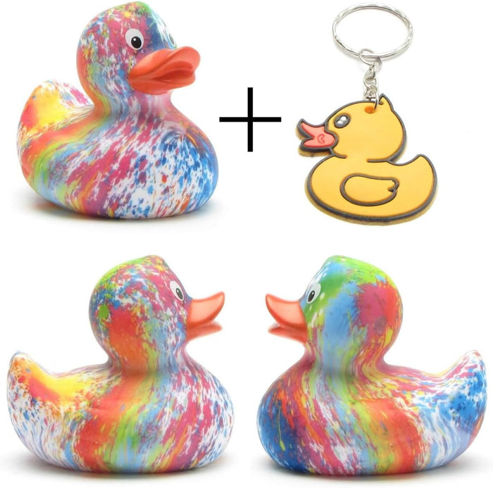 Three rainbow tie-dye rubber ducks shown from various angles with a yellow rubber duck keychain.
