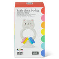White silicone bear toy with a suction base and four colorful rings, shown in its branded white and red box.