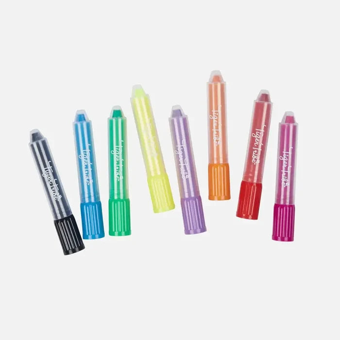 Eight vibrant twist-up crayons in clear plastic barrels fanned out against a plain light background.