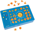 Blue board game with a yellow timer dial and various orange geometric shapes scattered on and around it.