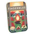 Rectangular game tin with camping illustration of a campfire, tents, and mountains. Tinderblox name on a wooden sign.