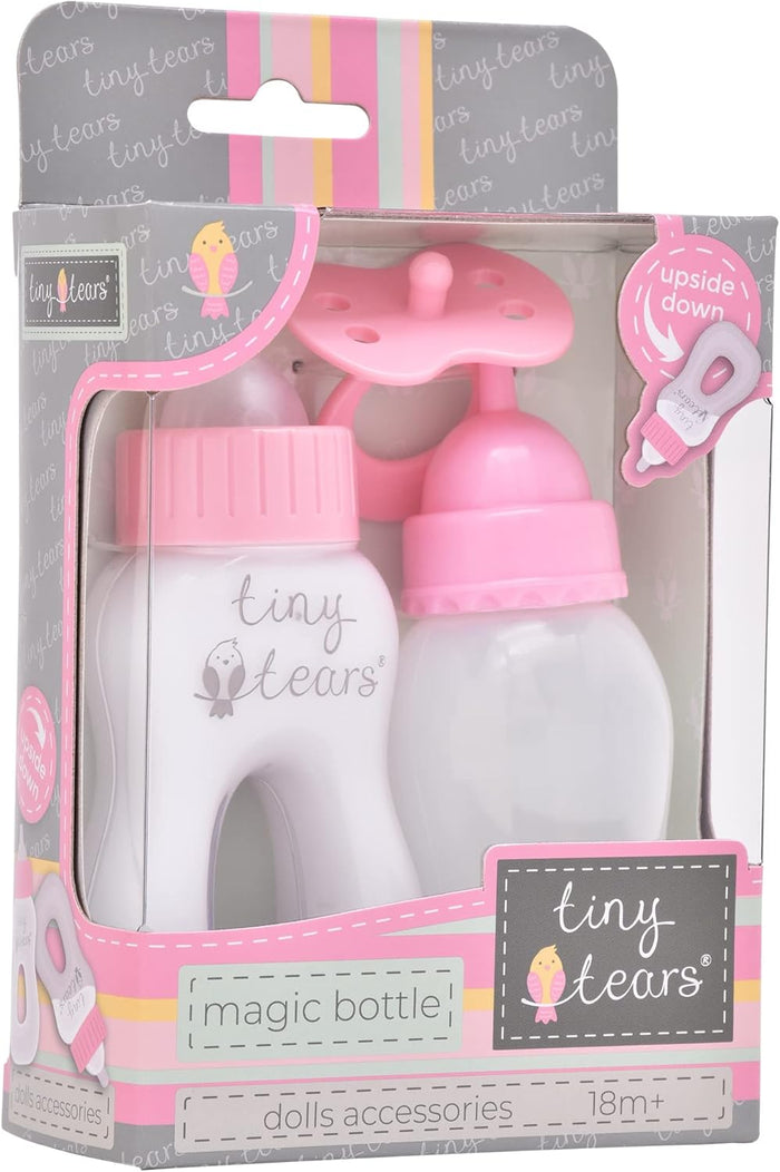Two toy doll bottles and a pink pacifier in pink and white Tiny Tears packaging with a bird logo.