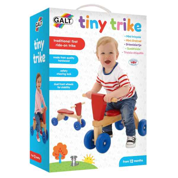 Box for Galt Tiny Trike wooden ride-on toy with blue wheels and red seat, featuring photos of children riding it.