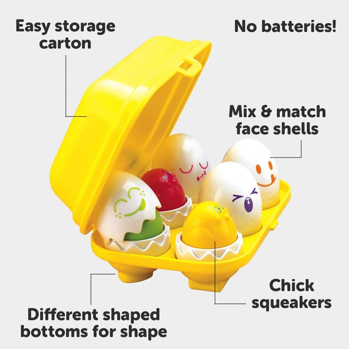 Yellow egg carton with six colorful chick toys inside white shells featuring different facial expressions.