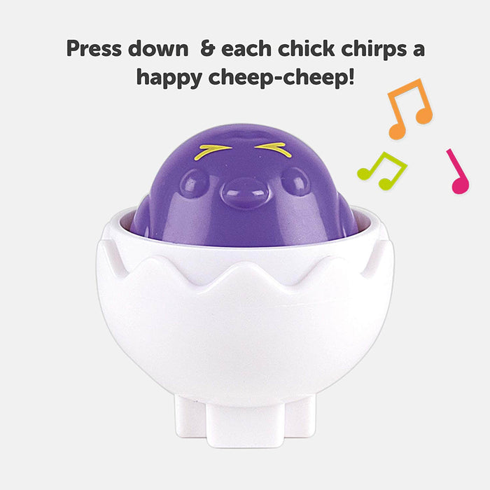Purple chick in a white eggshell. Text: Press down & each chick chirps a happy cheep-cheep!