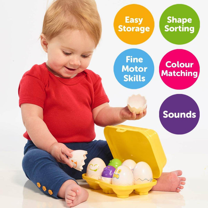 Toddler playing with yellow toy egg carton, white eggs, and colorful chicks. Text circles list developmental features.