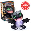 Black dragon toy with green eyes breathing purple mist, sitting with wings spread next to its retail box.
