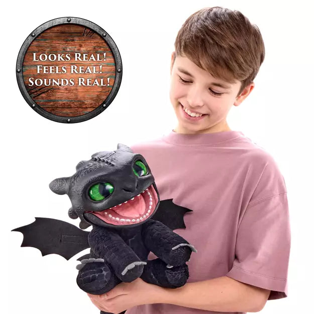 Boy holding a black dragon puppet with green eyes and open mouth. A wooden shield graphic lists product features.