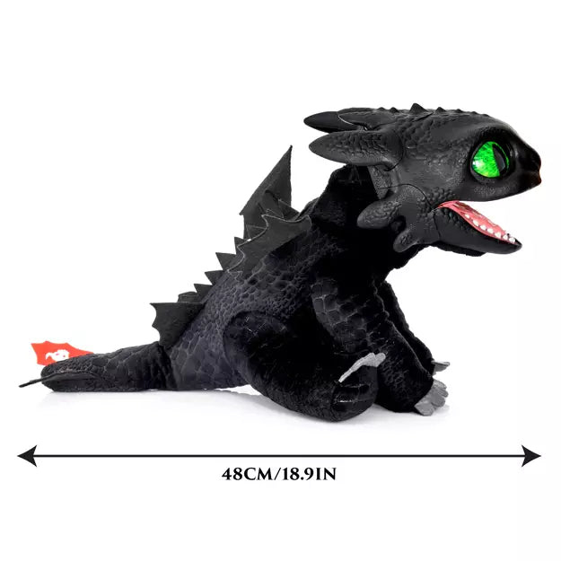 Plush black dragon with textured scales, glowing green eyes, and a red tail fin, measuring 18.9 inches long.