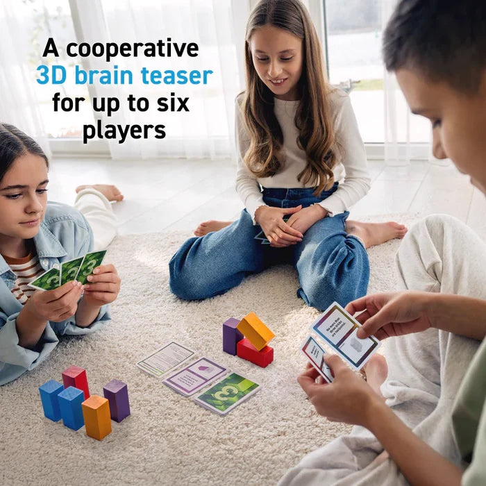 Three children sitting on a rug play a cooperative game using colorful wooden blocks and instruction cards.