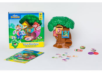 Children's game set featuring a green-topped plastic tree house, circular animal tokens, instructions, and product box.