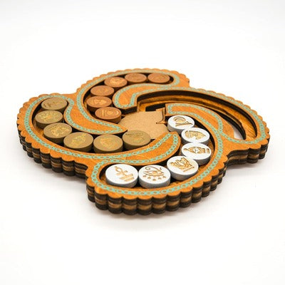 Swirling wooden puzzle with sliding circular coins etched with Egyptian symbols on a scalloped, tiered frame.