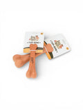 DogTreatNZ Tuff-Bone dog chew toy with durable, textured surface for strong chewers, designed for dogs' play and dental health.