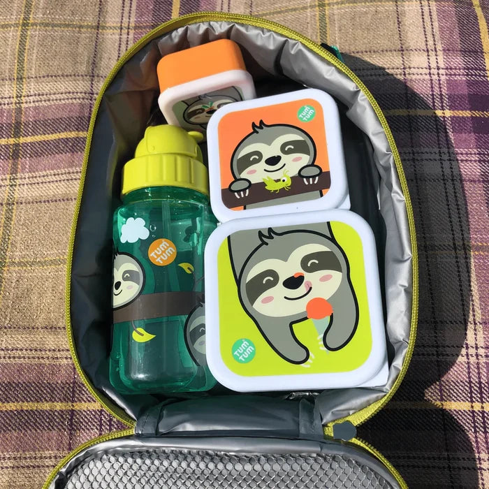 Open green insulated lunch bag containing three sloth-themed snack boxes and a matching water bottle.