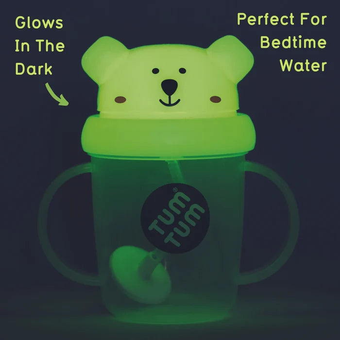 Green glowing sippy cup with two handles and a polar bear face lid, featuring a weighted internal straw.