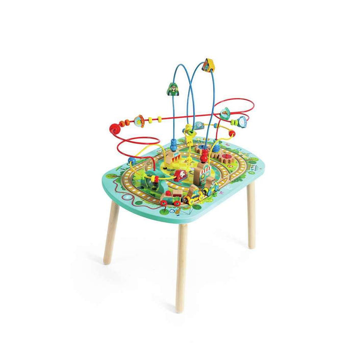 Wooden activity table with colorful wire bead mazes, train tracks, and small wooden vehicles on a light blue oval top.