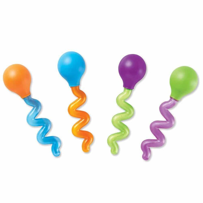 Four toy droppers with round bulbs and wavy translucent tubes in orange, blue, purple, and green.