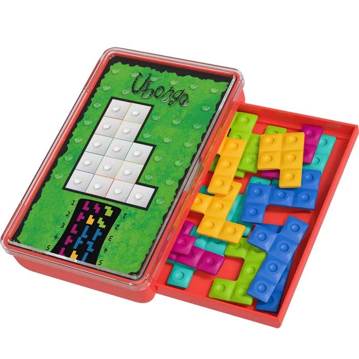 Red travel game with a green puzzle card and colorful geometric plastic pieces in an open sliding drawer.