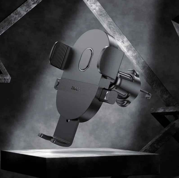Techplus universal gravity car phone holder mounted on air vent, with auto clamp grip for secure smartphone support.