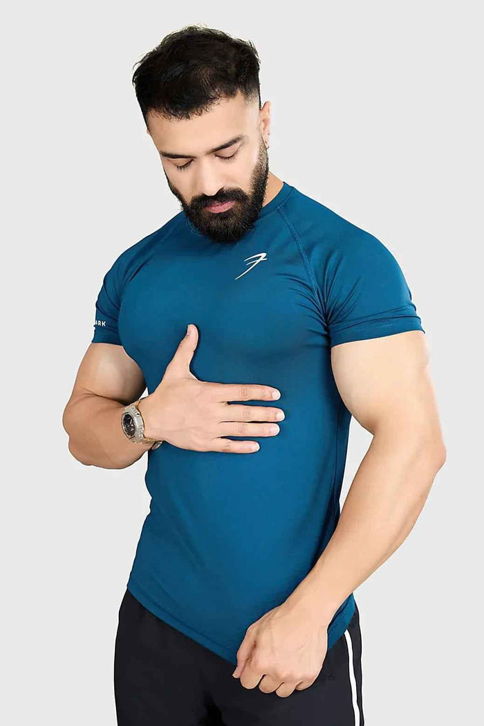 Fuaark Nz teal urban T-shirt for men, featuring a comfortable fit and casual style, laid flat on a white background.