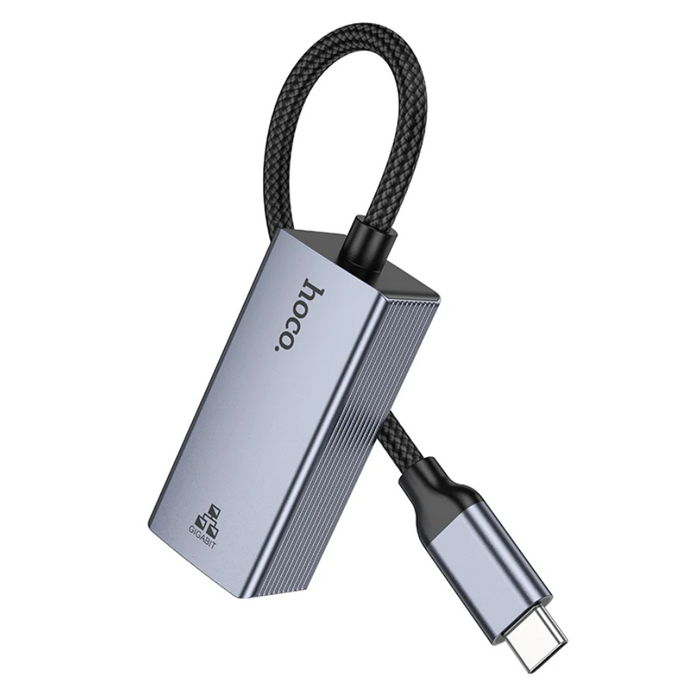 Techplus USB-C to RJ45 Ethernet adapter connecting a laptop to a wired Gigabit LAN network for fast internet access.