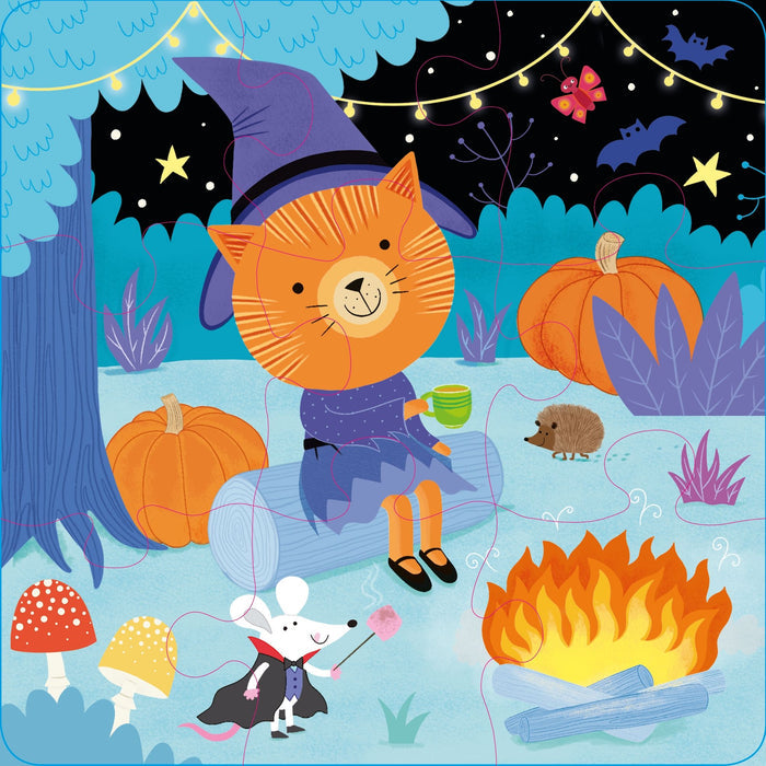 Jigsaw puzzle art of an orange cat witch and mouse vampire by a campfire in a night forest with pumpkins.
