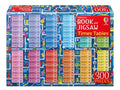 Blue Usborne puzzle box featuring colorful multiplication tables 1-12, small robots, and circuit-like patterns.
