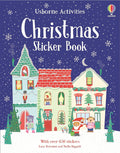 Book cover with three whimsical houses, festive animals, and snowflakes against a dark blue starry night sky.