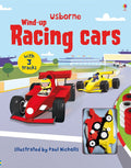 Illustrated book cover of race cars on a track with a cutout showing two wind-up toy cars, one red and one yellow.