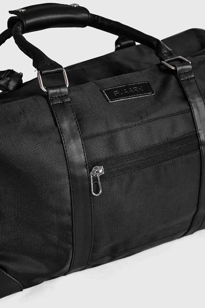 Black Vault Duffle Bag by Fuaark NZ, shown with sturdy handles and spacious interior for travel or gym use.