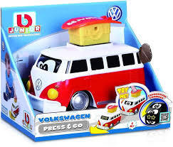 Red and white toy VW microbus with a surfboard and cartoon eyes, in blue display packaging with usage graphics.