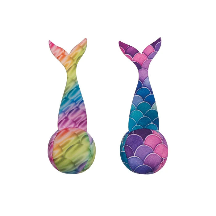 Two mermaid tail dive balls, one rainbow tie-dye and one with blue, purple, and pink fish scales.