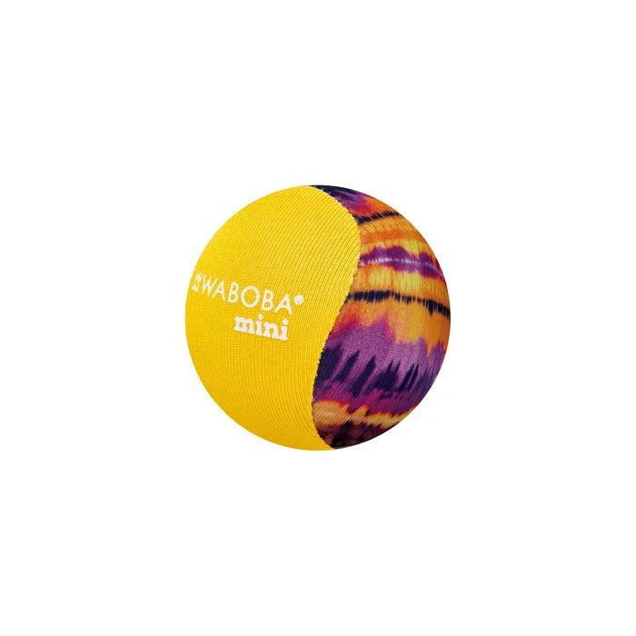 Round ball with one yellow half featuring white text and one half with a purple and orange tie-dye pattern.