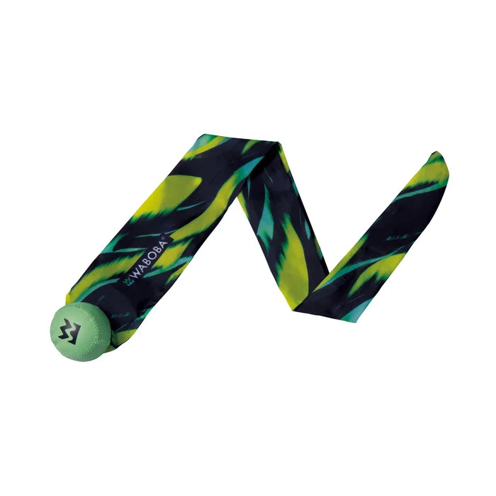 Small green ball with a long, flat fabric tail featuring a vibrant yellow and green abstract pattern.