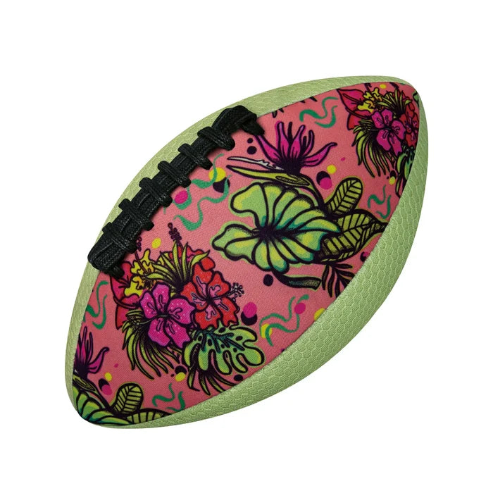 Pink football with tropical floral pattern, lime green textured panels, and black laces.