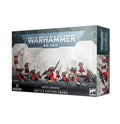 Warhammer 40,000 box showing eleven painted miniatures in black armor and red robes on a rocky landscape.