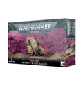 Box art for a green, spiked, three-wheeled mechanical creature miniature on a misty purple background.