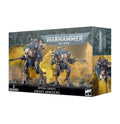 Box art for two blue and gold bipedal combat robots with long cannons, set against a ruined city and smoky yellow sky.